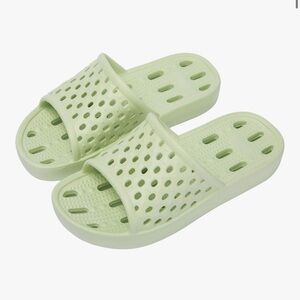 Lime green shower shoes with holes